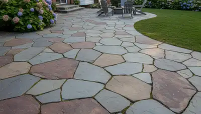 Natural slate flagstone patio installation with irregular pavers by Boston landscaping experts, Boston MA
